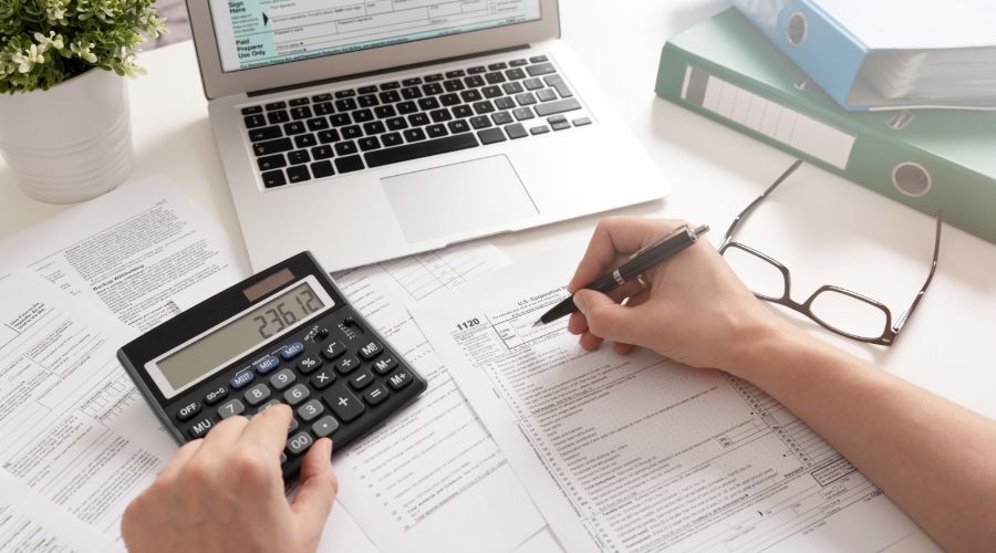 small business owner completing income tax Form 1120